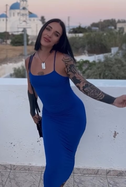 Toxic.mati-in-a-tight-blue-dress